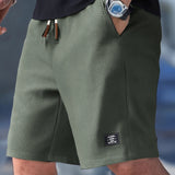 NATHAN | Kerged suvepüksid